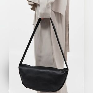 ST. AGNI SOFT CRESCENT BAG in Black.